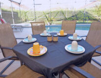 table, furniture, tableware, coffee table, vase, chair, floor, saucer, kitchen & dining room table